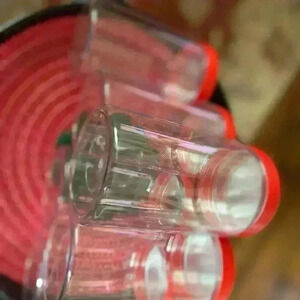 Set of 6 plastic containers clear with red lid 6.5 in height 11.5 width of jar